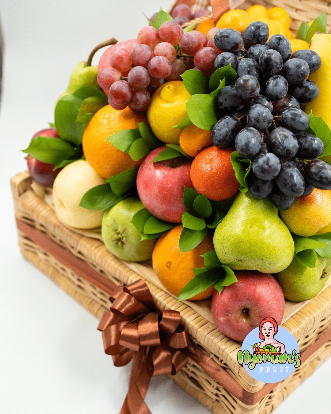 Camellia Shine 2 Detail Camellia Shine dengan susunan anggur, apel, pear, jeruk, lemon, dan pisang
