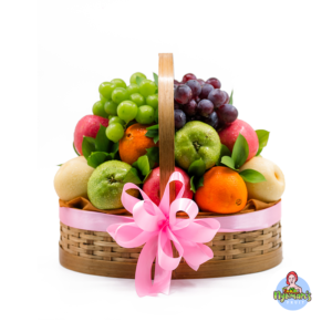 The Gift of Health and Happiness 12 Lilac Love hampers bali dengan keranjang bambu oval, pita pink, dan susunan buah segar