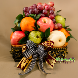 Detail parcel buah Sandat Pujungan dengan keben persegi ornamen gelap dan pita kotak hitam putih