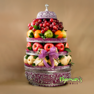 Soka Tigawasa parcel buah Bali dalam keben bulat bertingkat warna ungu